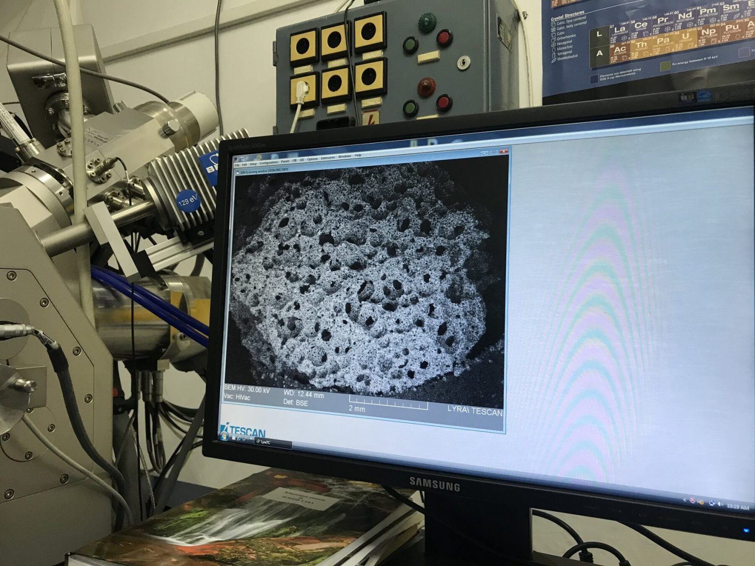 Scanning electron microscope screen showing the porous structure of a sample